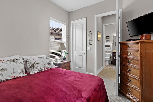 4195 Barletta Ct, Wesley Chapel, FL 33543 - bedroom featuring ensuite bath, light carpet, and light tile patterned floors