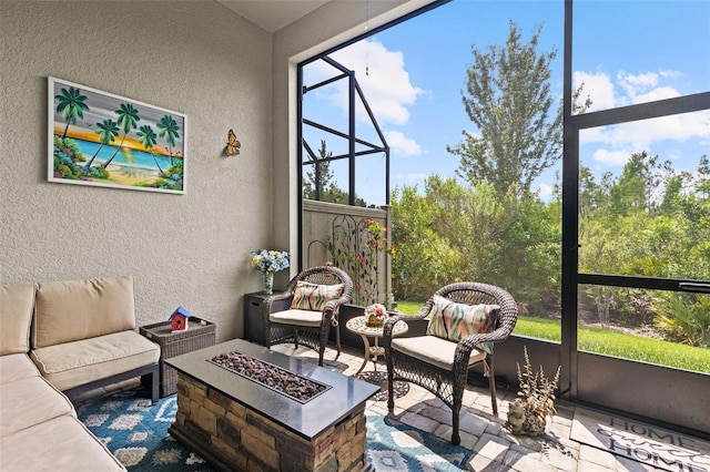 4195 Barletta Ct, Wesley Chapel, FL 33543 - sunroom featuring an outdoor living space with a fire pit