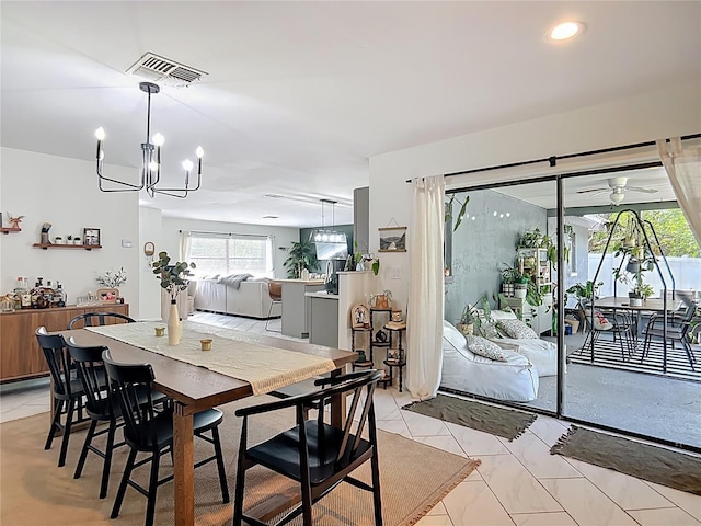 dining area with a chandelier