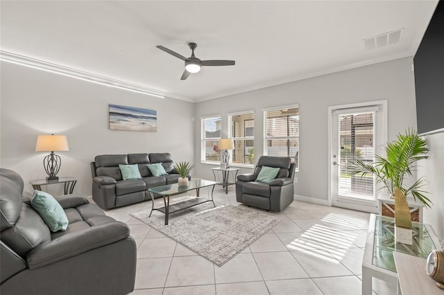 3212 Calvano Dr, Land O Lakes, FL 34639 - living area featuring ornamental molding, ceiling fan, light tile patterned floors, and baseboards