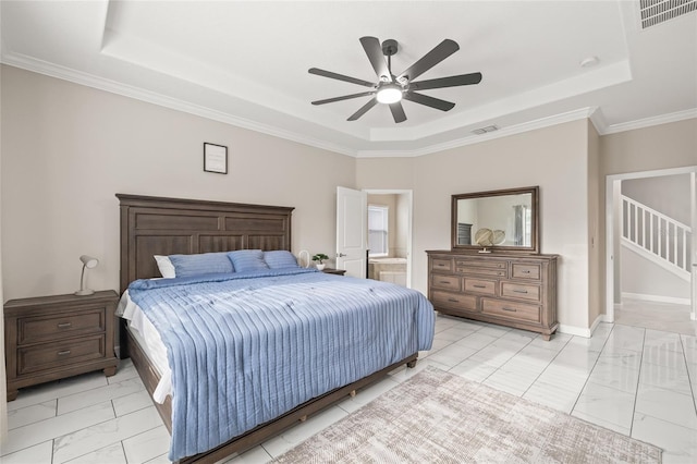 3212 Calvano Dr, Land O Lakes, FL 34639 - bedroom with a tray ceiling, light marble finish flooring, ceiling fan, crown molding, and ensuite bathroom
