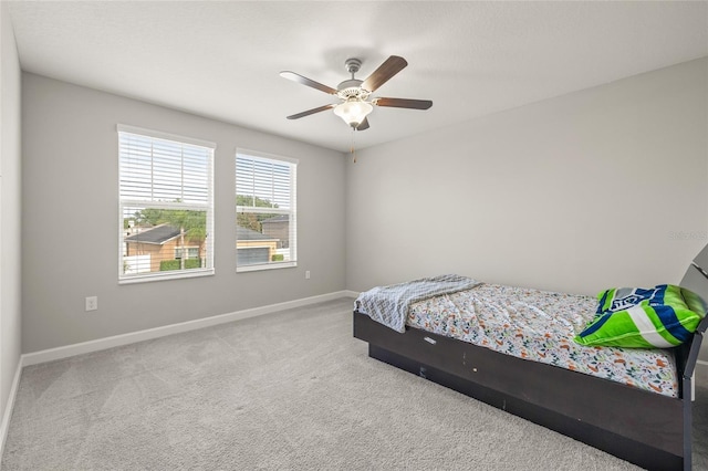 3212 Calvano Dr, Land O Lakes, FL 34639 - bedroom with carpet, baseboards, and ceiling fan