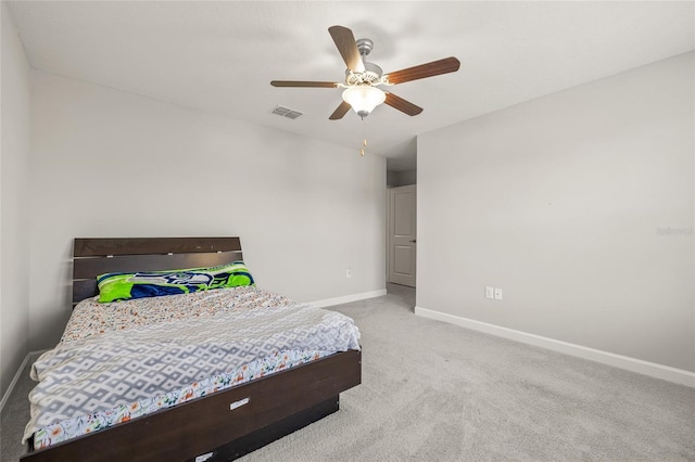 3212 Calvano Dr, Land O Lakes, FL 34639 - carpeted bedroom featuring baseboards and ceiling fan