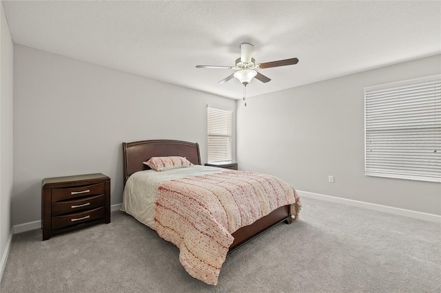 3212 Calvano Dr, Land O Lakes, FL 34639 - bedroom featuring carpet flooring, baseboards, and ceiling fan