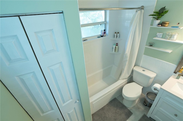 300 6th St N Unit E3, Safety Harbor, FL 34695 - full bathroom with toilet, tile patterned floors, vanity, shower / bath combination with curtain, and tile walls