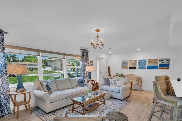 1769 Brookside Blvd, Largo, FL 33770 - living area featuring a chandelier, light wood-style flooring, and recessed lighting