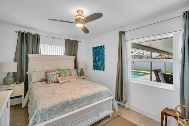 1769 Brookside Blvd, Largo, FL 33770 - bedroom featuring light wood-style floors and ceiling fan