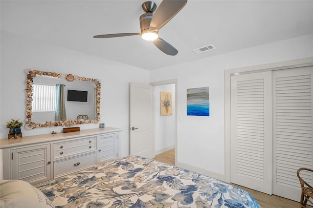 1769 Brookside Blvd, Largo, FL 33770 - bedroom featuring a closet, light wood-style floors, and ceiling fan