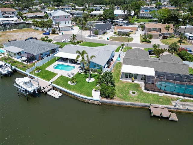 1769 Brookside Blvd, Largo, FL 33770 - aerial perspective of suburban area with a pool area and a large body of water