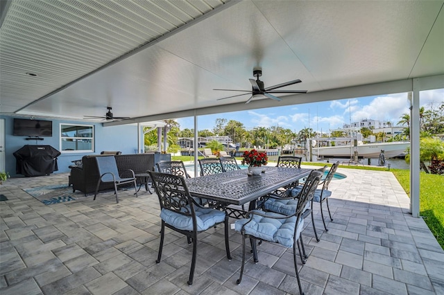 1769 Brookside Blvd, Largo, FL 33770 - view of patio / terrace with a ceiling fan and outdoor dining area