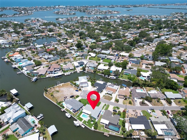1769 Brookside Blvd, Largo, FL 33770 - aerial view of property and surrounding area featuring a nearby body of water and nearby suburban area