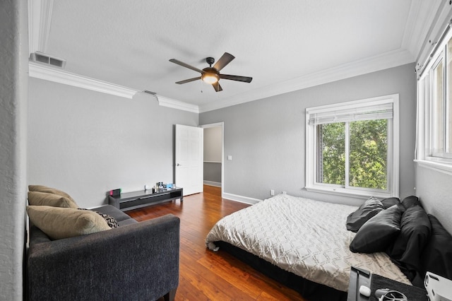 9722 Tiffany Oaks Ln, Tampa, FL 33612 - bedroom featuring crown molding, wood finished floors, ceiling fan, and baseboards