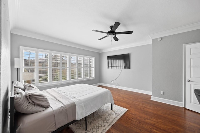 9722 Tiffany Oaks Ln, Tampa, FL 33612 - bedroom with crown molding, baseboards, dark wood finished floors, and ceiling fan