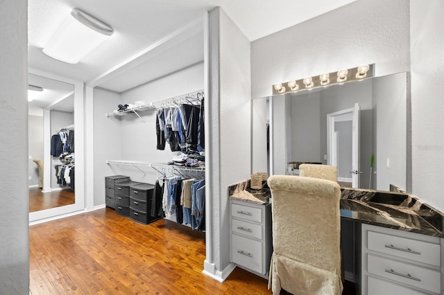 9722 Tiffany Oaks Ln, Tampa, FL 33612 - spacious closet featuring wood finished floors