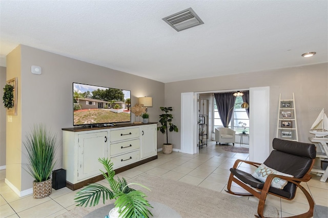 2012 Scotland Dr, Clearwater, FL 33763 - living area with light tile patterned flooring and baseboards