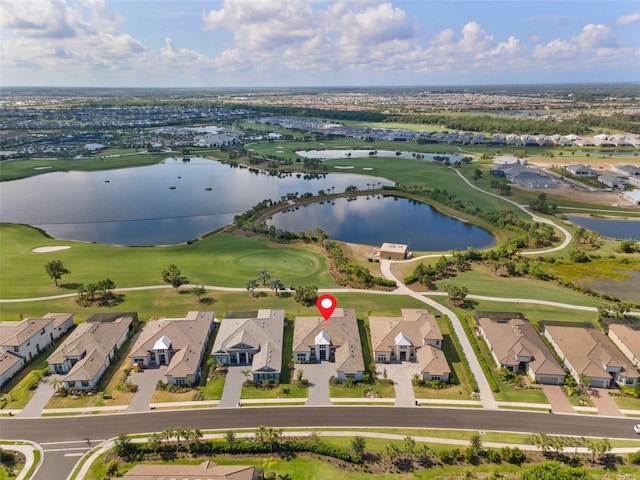 3888 Santa Caterina Blvd, Bradenton, FL 34211 - aerial view of residential area with a golf club and a nearby body of water