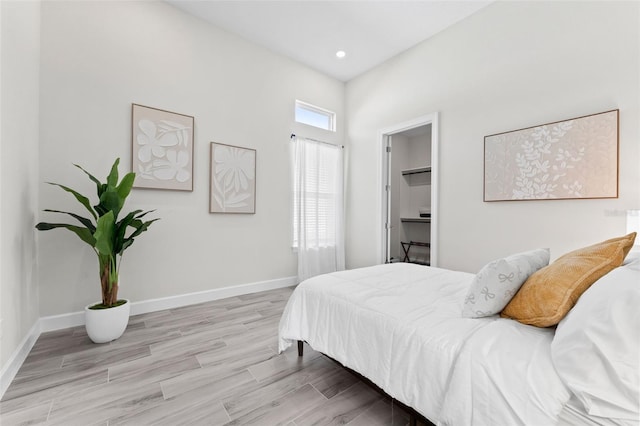 3888 Santa Caterina Blvd, Bradenton, FL 34211 - bedroom featuring wood finished floors and a walk in closet
