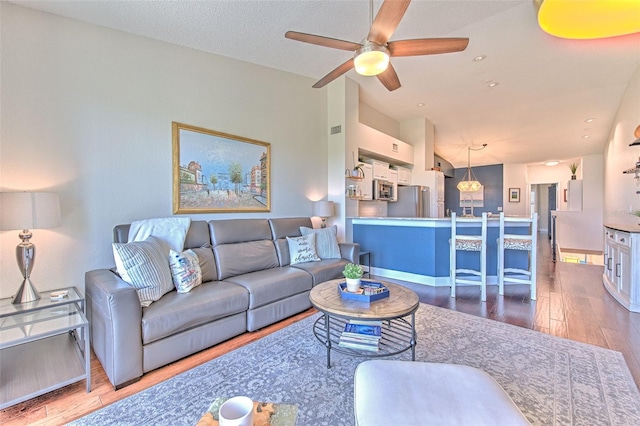 1111 Normandy Trace Rd Unit 1111, Tampa, FL 33602 - living area featuring wood finished floors and a ceiling fan
