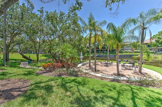 1111 Normandy Trace Rd Unit 1111, Tampa, FL 33602 - view of grassy yard featuring a patio and a water view