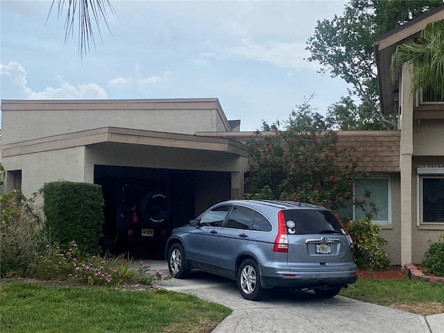 view of vehicle parking with driveway