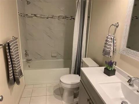 2720 Sand Hollow Ct Unit 156A, Clearwater, FL 33761 - full bathroom with toilet, tile patterned flooring, shower / bath combination with curtain, and vanity
