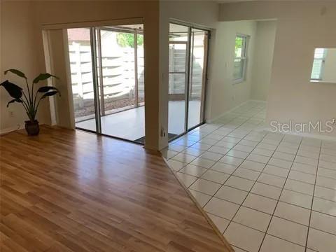 2720 Sand Hollow Ct Unit 156A, Clearwater, FL 33761 - spare room featuring light wood-type flooring and baseboards