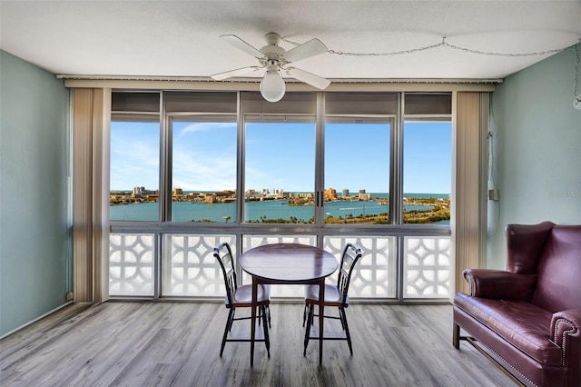 31 Island Way Unit 1403, Clearwater Beach, FL 33767 - sunroom featuring a water view
