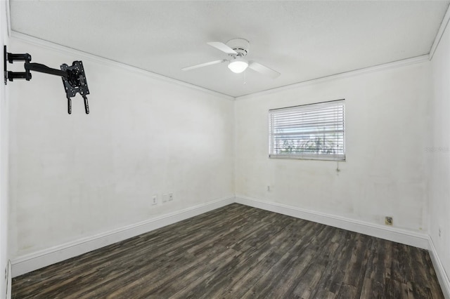 503 Holt Cir, Winter Haven, FL 33880 - spare room with dark wood-style floors, crown molding, baseboards, and a ceiling fan
