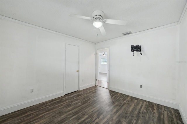 503 Holt Cir, Winter Haven, FL 33880 - unfurnished bedroom with wood finished floors, ornamental molding, baseboards, and a ceiling fan