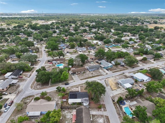 503 Holt Cir, Winter Haven, FL 33880 - aerial overview of property's location with nearby suburban area and a pool area