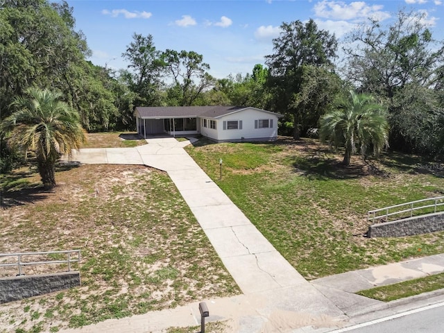 11409 Spring Hill Dr, Spring Hill, FL 34609 - ranch-style home with driveway