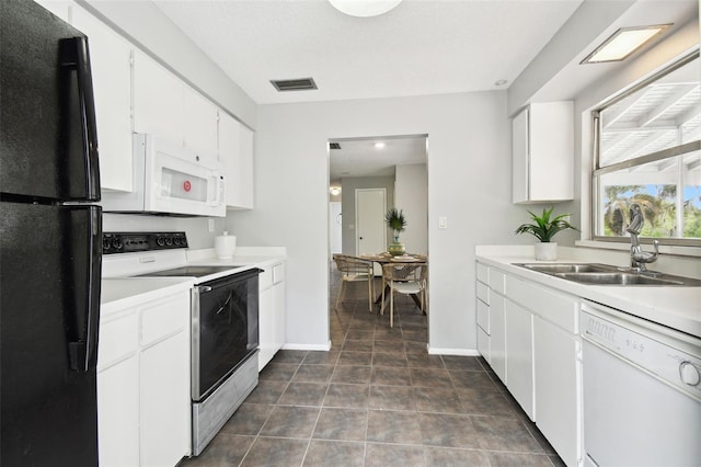 11409 Spring Hill Dr, Spring Hill, FL 34609 - kitchen with white appliances, a sink, light countertops, baseboards, and white cabinetry