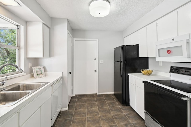 11409 Spring Hill Dr, Spring Hill, FL 34609 - kitchen with white appliances, a sink, white cabinets, a textured ceiling, and light countertops