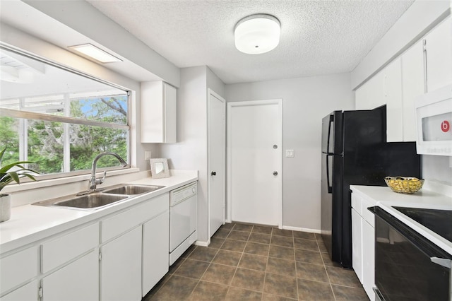 11409 Spring Hill Dr, Spring Hill, FL 34609 - kitchen with a sink, white appliances, a textured ceiling, white cabinets, and light countertops