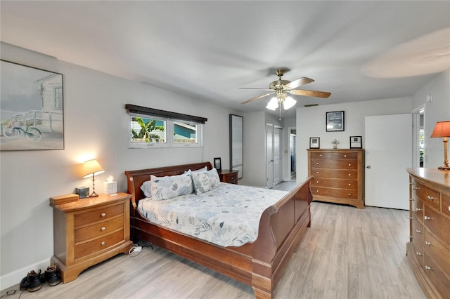 6530 Manila Palm Way, Apollo Beach, FL 33572 - bedroom with light wood-style flooring and ceiling fan