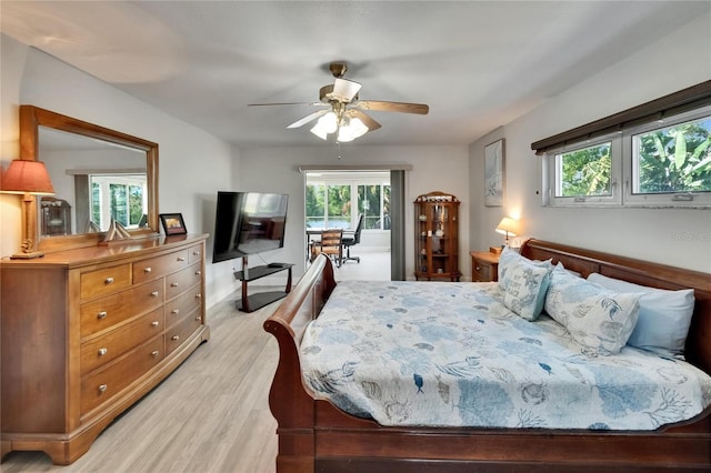 6530 Manila Palm Way, Apollo Beach, FL 33572 - bedroom with light wood-type flooring and a ceiling fan