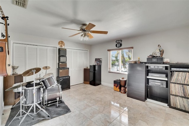 6530 Manila Palm Way, Apollo Beach, FL 33572 - office with a ceiling fan, marble finish flooring, and baseboards