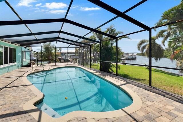 6530 Manila Palm Way, Apollo Beach, FL 33572 - swimming pool with a water view, a patio area, a yard, and glass enclosure