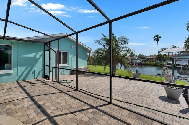 6530 Manila Palm Way, Apollo Beach, FL 33572 - view of patio with a water view and a lanai