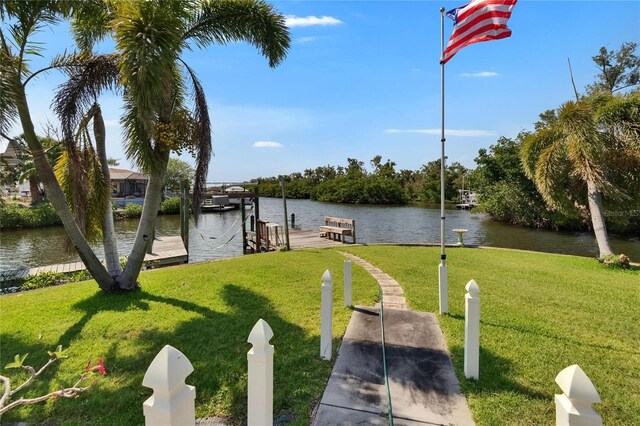 6530 Manila Palm Way, Apollo Beach, FL 33572 - dock area featuring a lawn and a water view