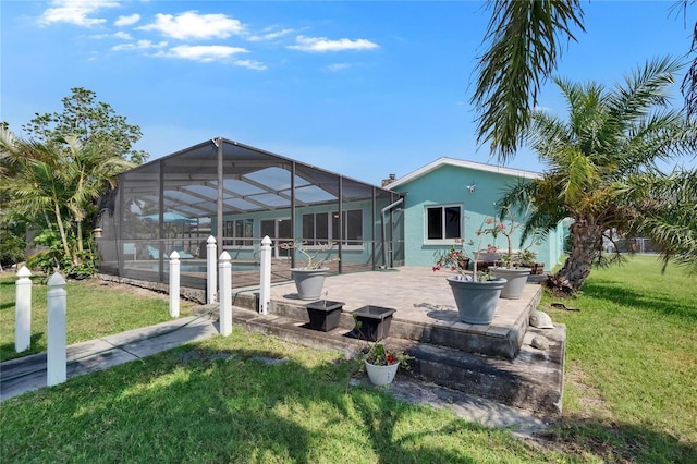 6530 Manila Palm Way, Apollo Beach, FL 33572 - back of house featuring an outdoor pool, a lawn, a patio, and a lanai