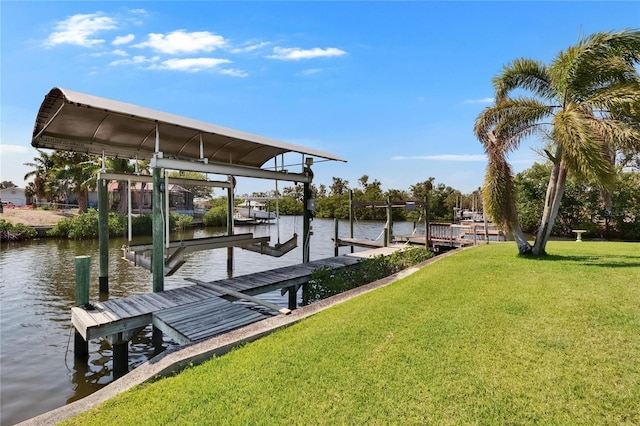 6530 Manila Palm Way, Apollo Beach, FL 33572 - dock featuring boat lift, a yard, and a water view