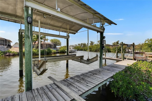 6530 Manila Palm Way, Apollo Beach, FL 33572 - dock featuring boat lift and a water view