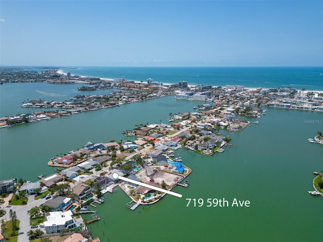 719 59th Ave, St Pete Beach, FL 33706 - aerial view of property and surrounding area featuring a nearby body of water