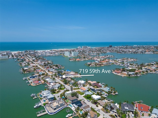 719 59th Ave, St Pete Beach, FL 33706 - aerial overview of property's location with a large body of water and a marina