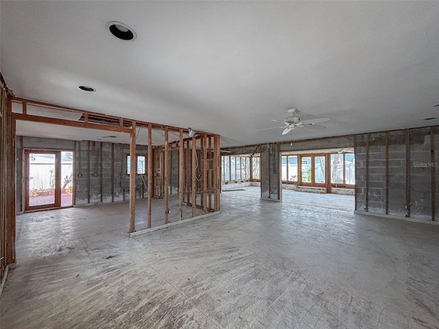 719 59th Ave, St Pete Beach, FL 33706 - unfurnished living room with a ceiling fan