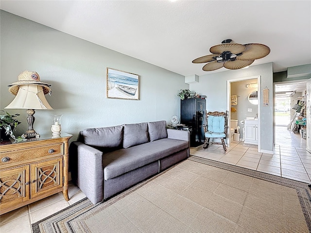 120 1st St E Unit 104, Saint Petersburg, FL 33715 - living room with light tile patterned floors and ceiling fan