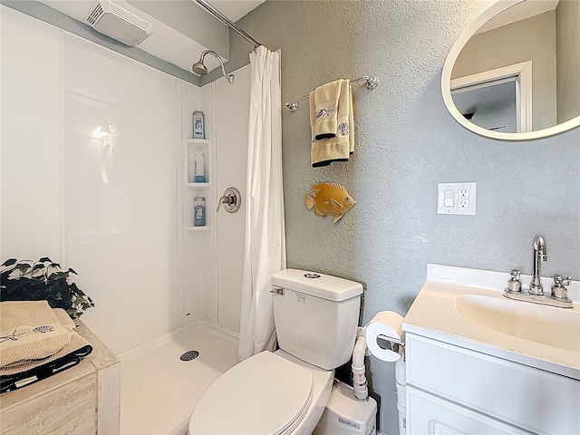 120 1st St E Unit 104, Saint Petersburg, FL 33715 - bathroom with a textured wall, vanity, and a shower with shower curtain