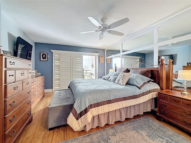 120 1st St E Unit 104, Saint Petersburg, FL 33715 - bedroom featuring wood finished floors and ceiling fan