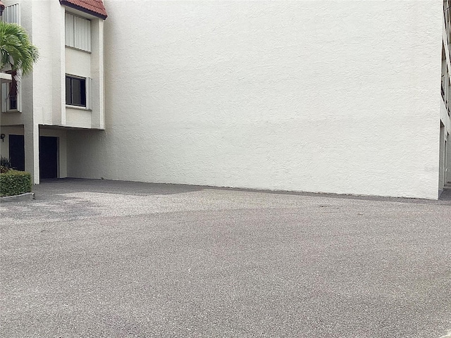 120 1st St E Unit 104, Saint Petersburg, FL 33715 - exterior space featuring stucco siding